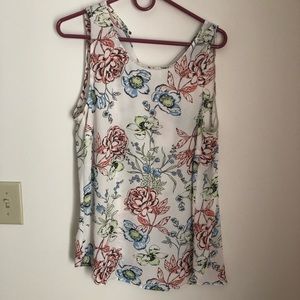 Light pink floral sleeveless blouse